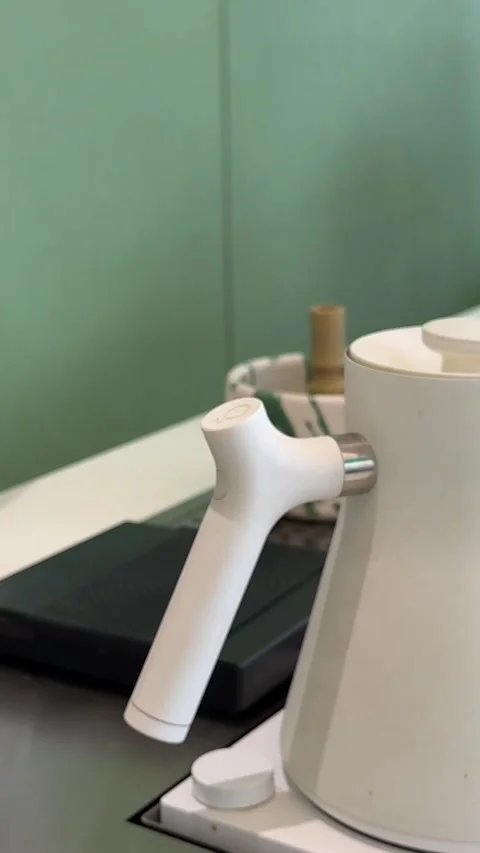 Step by step tutorial making Japanese matcha tea. Step one , putting green Video stock 323723146