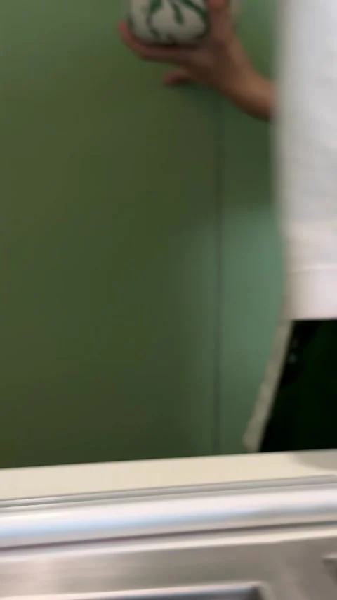 Step by step tutorial making Japanese matcha tea. Step one , putting green Video stock 323724429