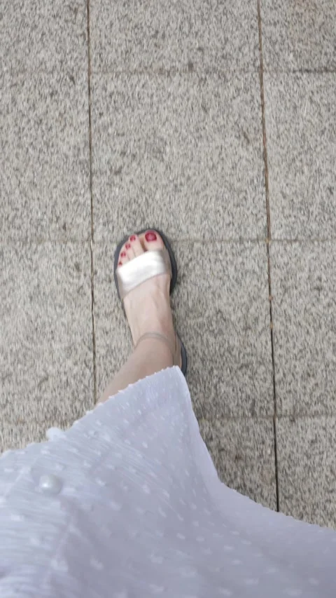 Step by step. Woman's legs walking down the street. Steps tracing the human path Stock Footage 277329724