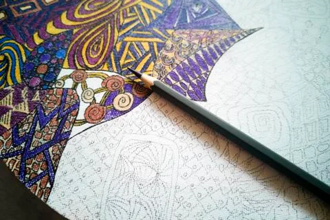 Step-by-step zentangle DIY round wall clock-draft coloring process,purple pencil Stock Photos