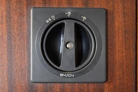 Step switch for attenuating the high volume on speaker. Stock Photos