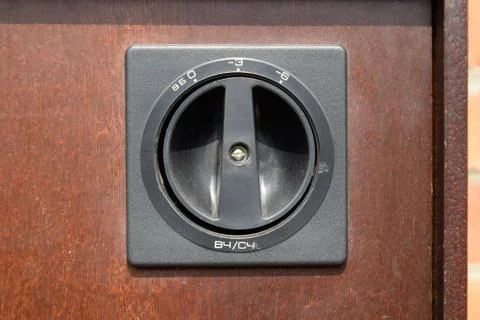 Step switch for attenuating the high volume on speaker. Stock Photos