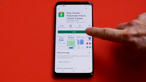 The Step Tracker mobile application is installed on t Stock Footage 151683566
