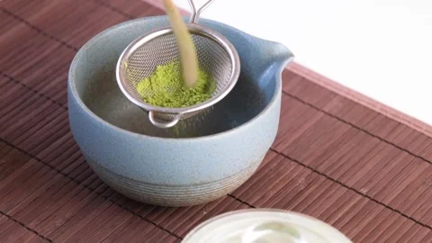 Step two , sieving matcha powder 스톡 동영상 294316890