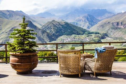 STEPANTSMINDA, GEORGIA - september 15, 2018: people eat and relax on terrace  Stock Photos