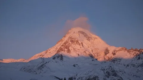 Stepantsminda, Gergeti, Georgia. Peak Of Mount Kazbek Covered With Snow. Kazbek Stock Footage 105127689
