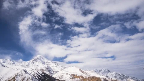 Stepantsminda, Gergeti, Georgia. Peak Of Mount Kazbek Covered With Snow Stock Footage 105127855