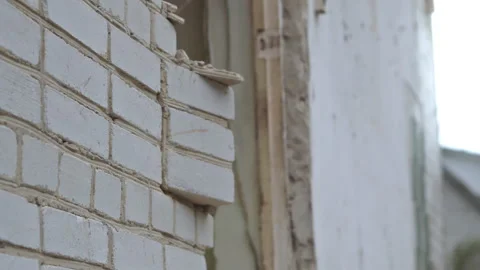 The StepbyStep Demolition Process Involved in Taking Down a Section of a Brick 動画素材 314572294