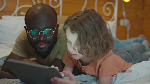 Stepfather and His Son Using Digital Tablet Stock Footage 252640631