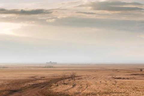 Steppe road, Elevator in the horizon Stock Photos