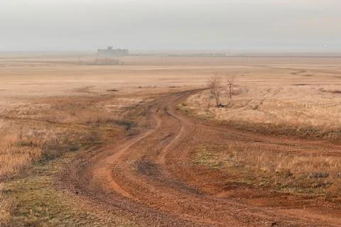 Steppe road, Elevator in the horizon Stock Photos