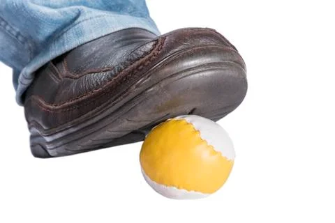 Stepped on ball Stock-Fotos