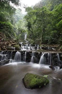 Stepped waterfall in the wild Foto stock