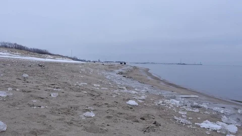 Stepping along cold Winter icy silent Baltic sea Stock Footage 85682076