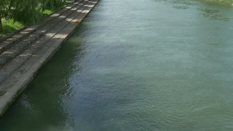 Stepping on the Bank of River Stock Footage 108970996