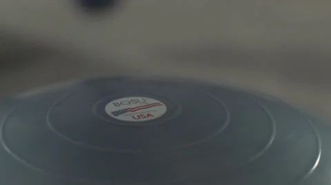 Stepping on a bosu ball in super slow motion Stock Footage 37013355