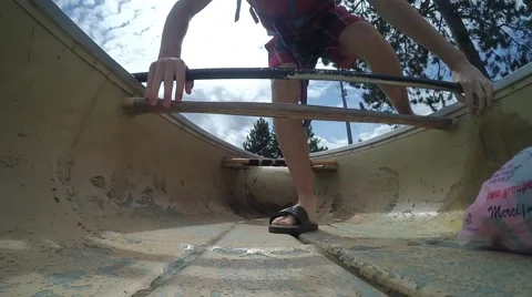 Stepping into canoe - action camera Stock Footage 68920193
