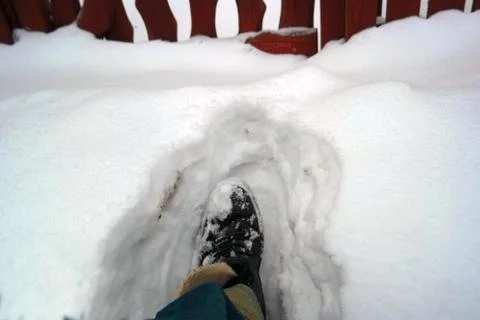 Stepping into a deep snow 写真素材