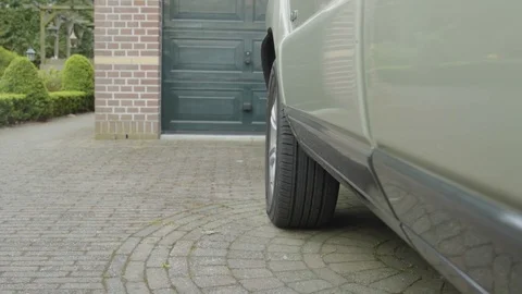 Stepping inside a car Stock Footage 78030396