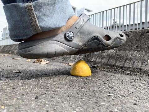 Stepping on a lemon Stock Photos