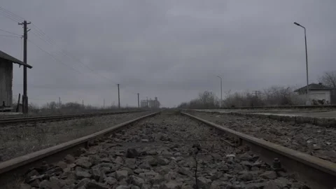 Stepping on the rails of the train 스톡 동영상 137764775