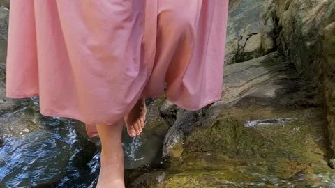 Stepping on rocks Stock Footage 288851394