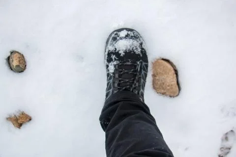 Stepping on snow Stock Photos