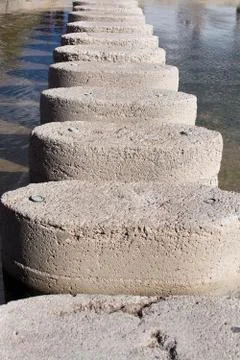 Stepping stones background Stock Photos
