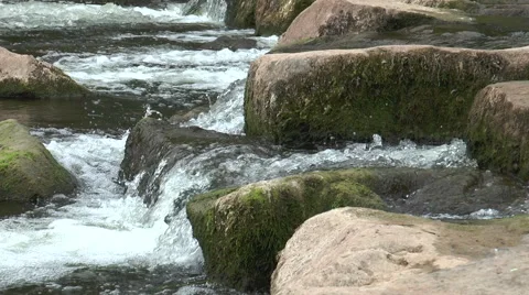 Stepping stones below Monnow medieval bridge and gate 1 Video stock 40686515