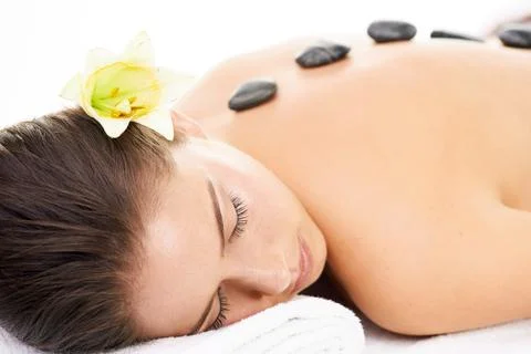 The stepping stones to true relaxation. a young woman getting a beauty treatment Stock Photos