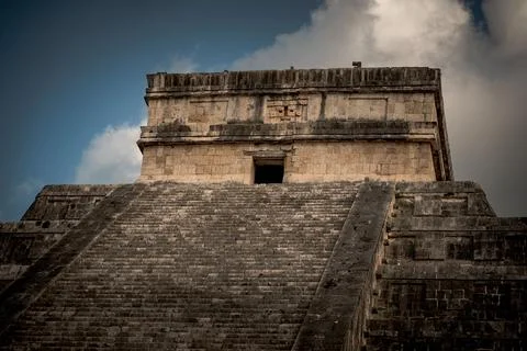 The steps up to a building that is covered in stone Fotos de archivo
