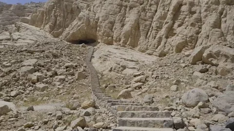 Steps to cave in mountain Stock Footage 196794600