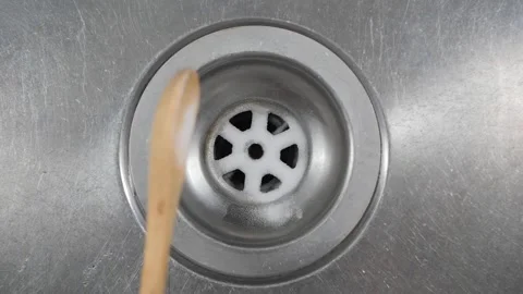 Steps to clean a kitchen sink with baking soda Stock Footage 343478072