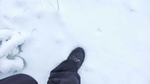 Steps on fresh friable snow Stock Footage 121311957