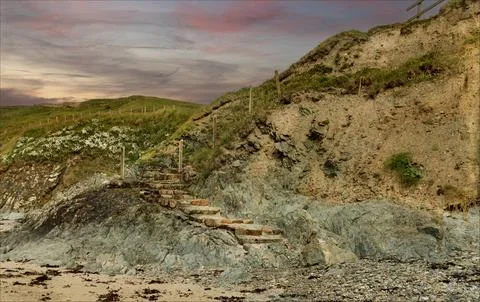 Steps going down a hillside that has crumbled and is no longer useable Stock Photos