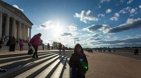 Steps of the Jefferson Memorial looking into the sun time lapse Video stock 61742122