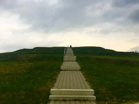 Steps that lead up a hill	 Stock Photos