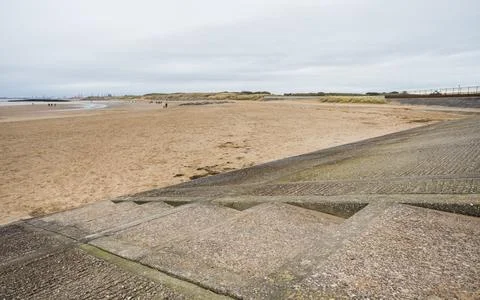 Steps leading down to Leasowe beach Stock Photos