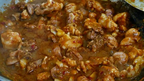 Steps to make a chicken spicy curry in thai style. Contains chicken, chilli.. Vídeos de archivo 76246165