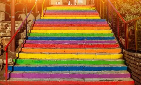 Steps painted in different rainbow colors. Rainbow stairs. Stock Photos