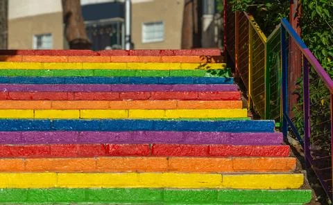 Steps painted in different rainbow colors. Rainbow stairs. Stock Photos