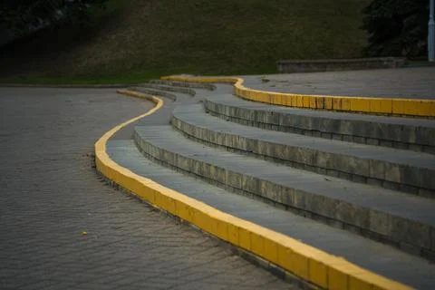 The steps in the park, the edges are painted yellow Stock Photos