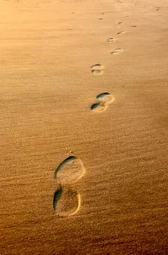 Steps on sandy beach in evening Stock Photos