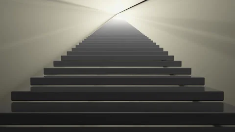 The steps of the staircase go into the distance towards the bright light Video stock 270610088