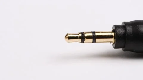 Stereo audio jack 3,5 mm, on white background. Movement from right to left Stock Footage 237506265