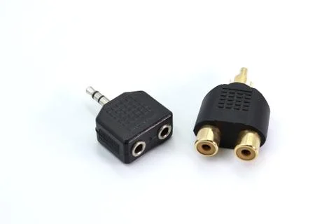 Stereo Plug To Dual RCA Jack Adapter isolated on white background. Stock Photos