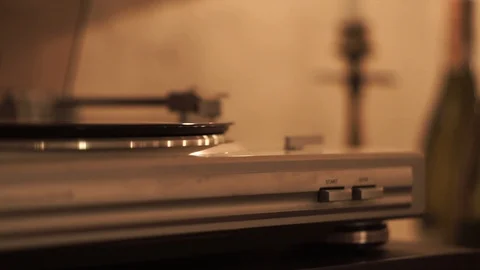 Stereo turntable record player with spinning vintage vinyl disc playing music 스톡 동영상 107777513
