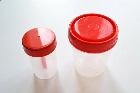 Sterile clear empty plastic container for analysis. Stock Photos