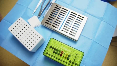 Sterile prepared dental extraction tools. Stainless steel tools for surgery Stock Footage 300578052
