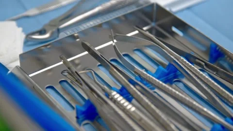Sterile prepared dental extraction tools. Stainless steel tools for surgery Stock Footage 300578056